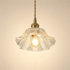 Suspension vintage en verre transparent petite fleur tulipe 19cm avec cordon tressé et ampoule Edison allumée