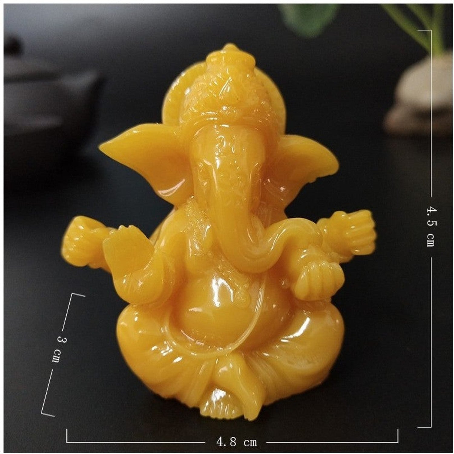 Figurine Ganesha finition Orange ambre résine