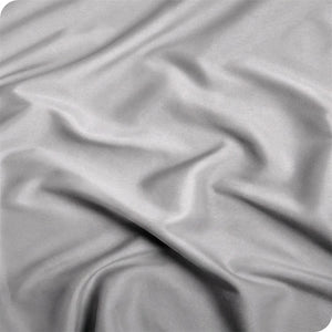 Gros plan sur le tissage doux du coton égyptien gris