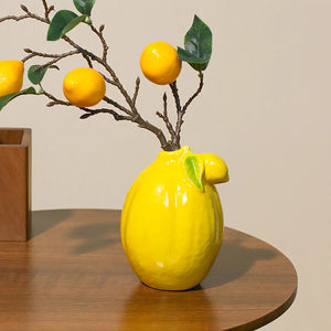 Vase citron céramique jaune fond beige texturé