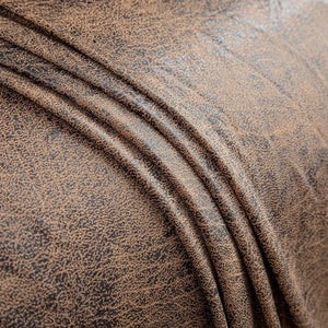 Gros plan sur la texture tissée et élastique du tissu de la housse de canapé