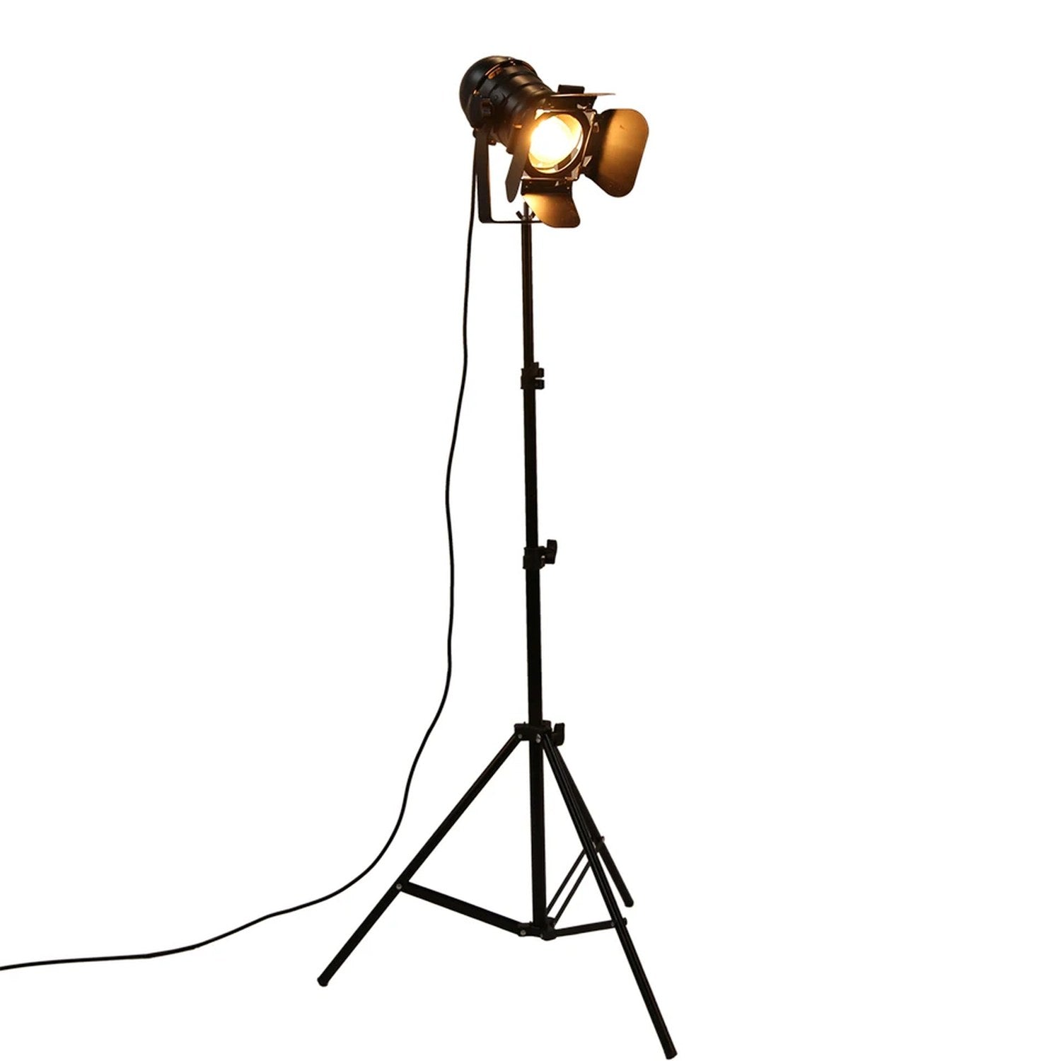 Lampadaire trépied projecteur noir fond blanc