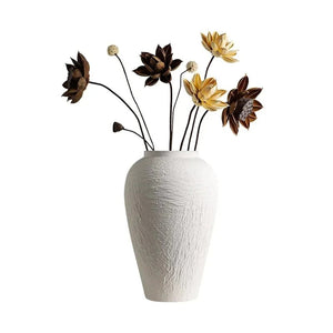 Vase en céramique blanche silhouette ovale avec fleurs séchées