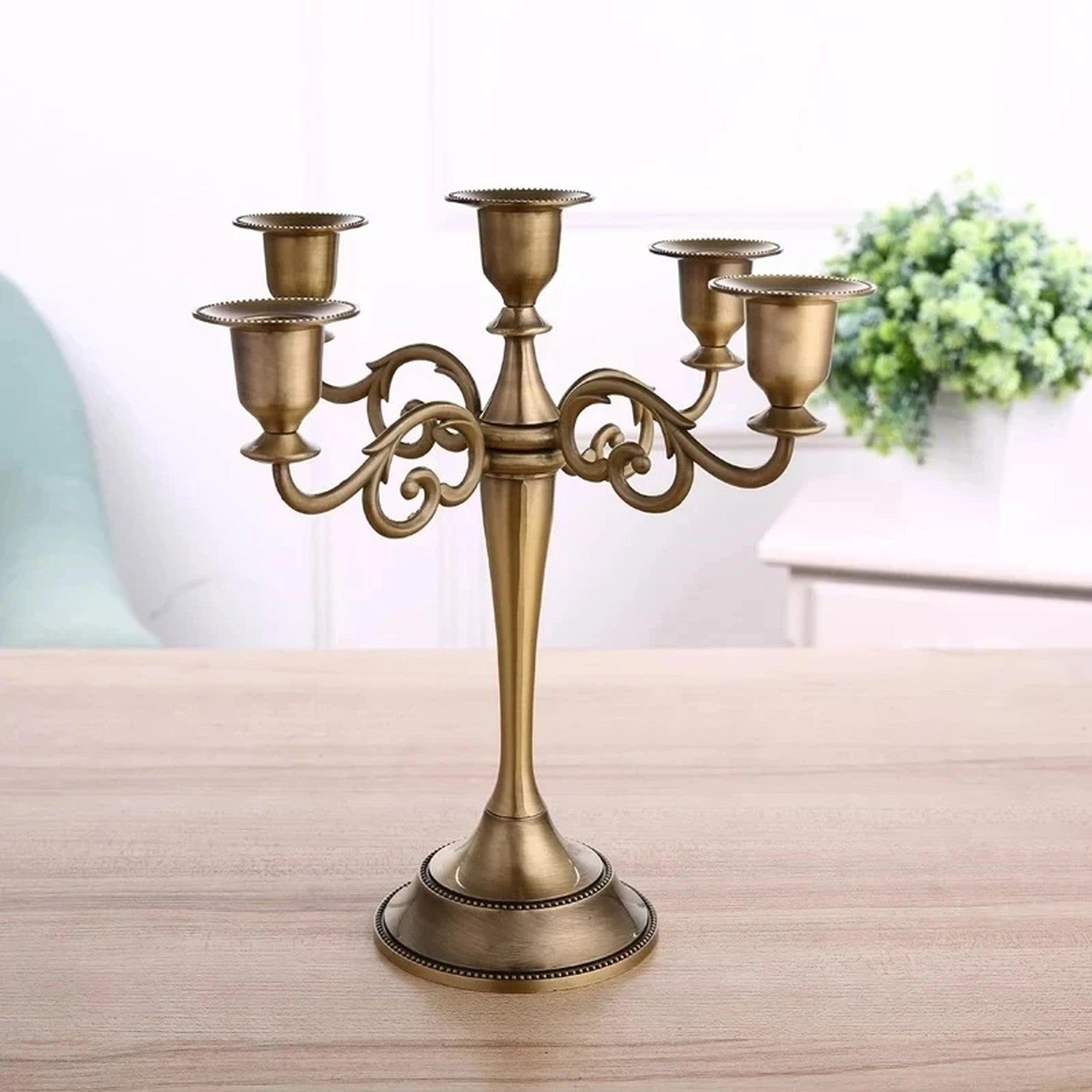 Chandelier arabesque 5 bras bronze style Art Déco décoration intérieure