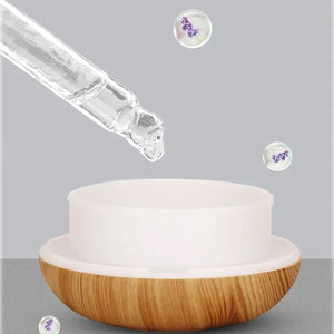 Ajout de quelques gouttes d huile essentielle dans le diffuseur 200ml