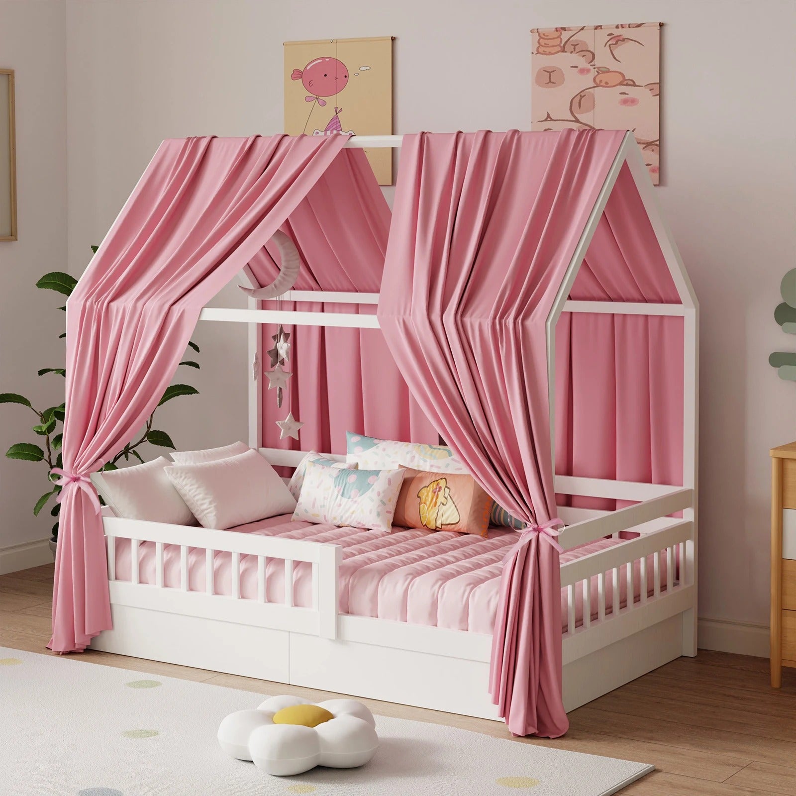 Photo produit du ciel de lit cabane rose drapé avec nœuds sur les montants