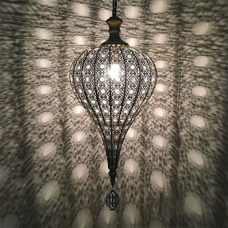 Suspension métal forgé ajouré - détail motifs orientaux