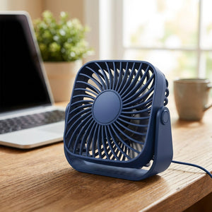 Ventilateur de bureau USB bleu posé sur un bureau