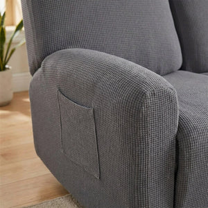 Gros plan sur le tissu jacquard gaufré et la poche latérale de la housse de fauteuil relax