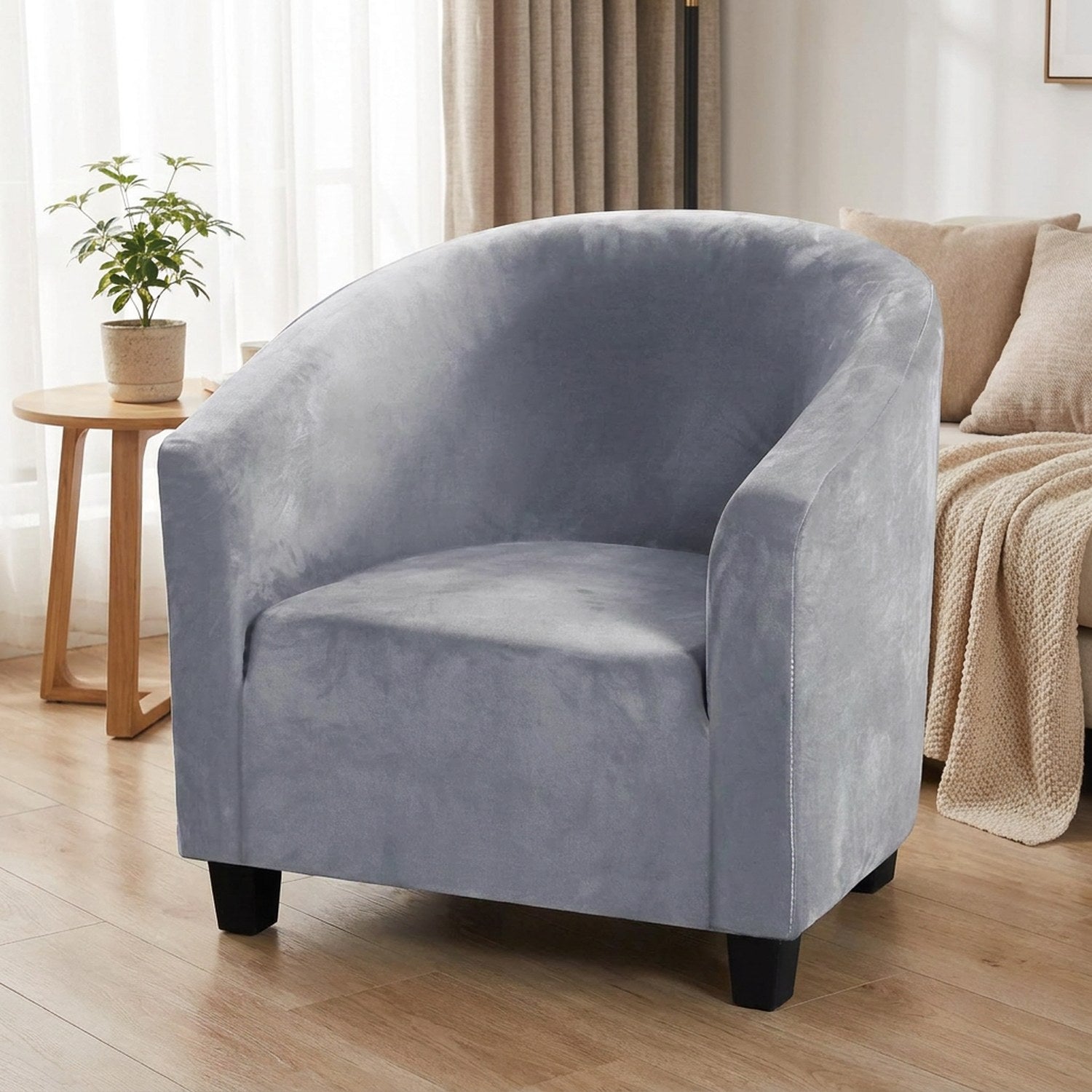 Housse de fauteuil club en velours Gris clair installée sur un cabriolet