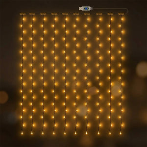 Guirlande lumineuse LED lumière blanc chaud en rideau vue de près
