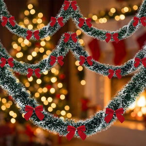 Guirlande tinsel givrée avec nœuds rouges