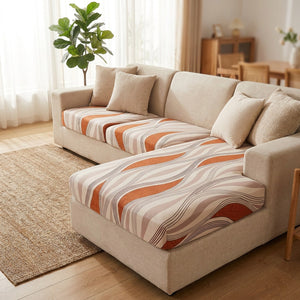 Housse de coussin d'assise motif vagues terracotta sur un canapé d'angle