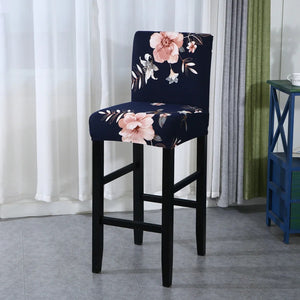 Housse de chaise de bar motif pivoines roses sur bleu nuit vue du tissu extensible
