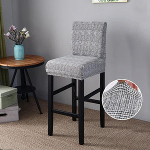 Housse de chaise de bar motif chiné gris clair vue du tissu extensible