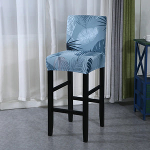 Housse de chaise de bar motif feuilles tropicales bleu vue du tissu extensible