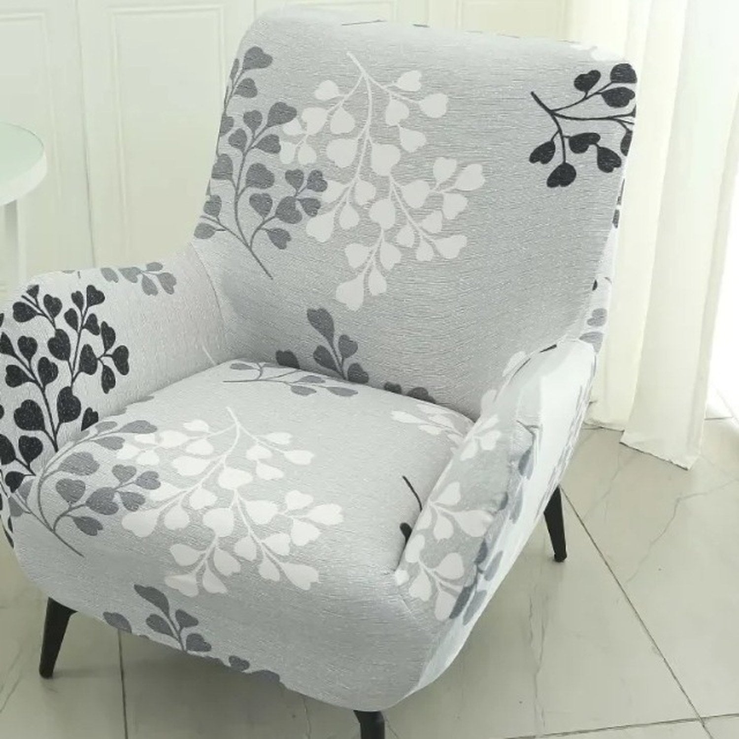 Housse de fauteuil imprimée feuillage gris