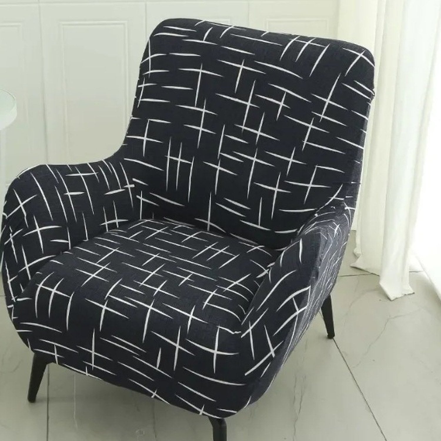 Housse de fauteuil imprimée quadrillage noir