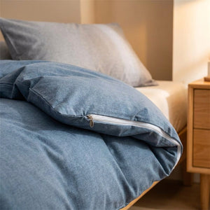 Détail du tissu microfibre au toucher lavé et de la fermeture éclair de la housse