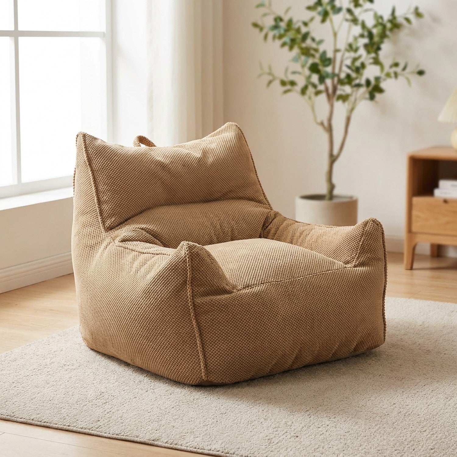Fauteuil poire une place en coton gaufré kaki dans un intérieur chaleureux