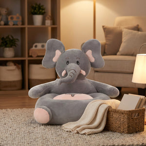 Pouf enfant éléphant en peluche installé dans un coin lecture chaleureux