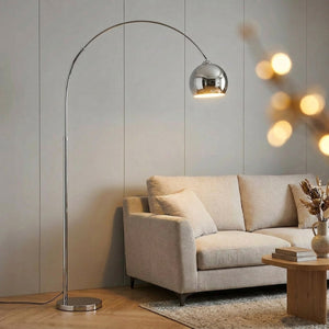 Lampadaire arc argenté petit modèle abat-jour sphérique 20cm allumé