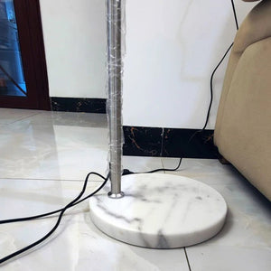 Base marbre blanc lampadaire arc détail qualité