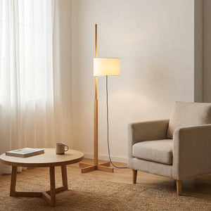 Coin lecture avec lampadaire japonais abat-jour tissu et fauteuil en osier