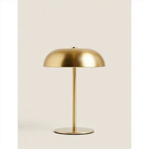 Lampe de chevet champignon dorée, vue de face sur fond neutre