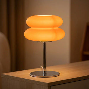 Lampe de chevet galet coloris orange allumée