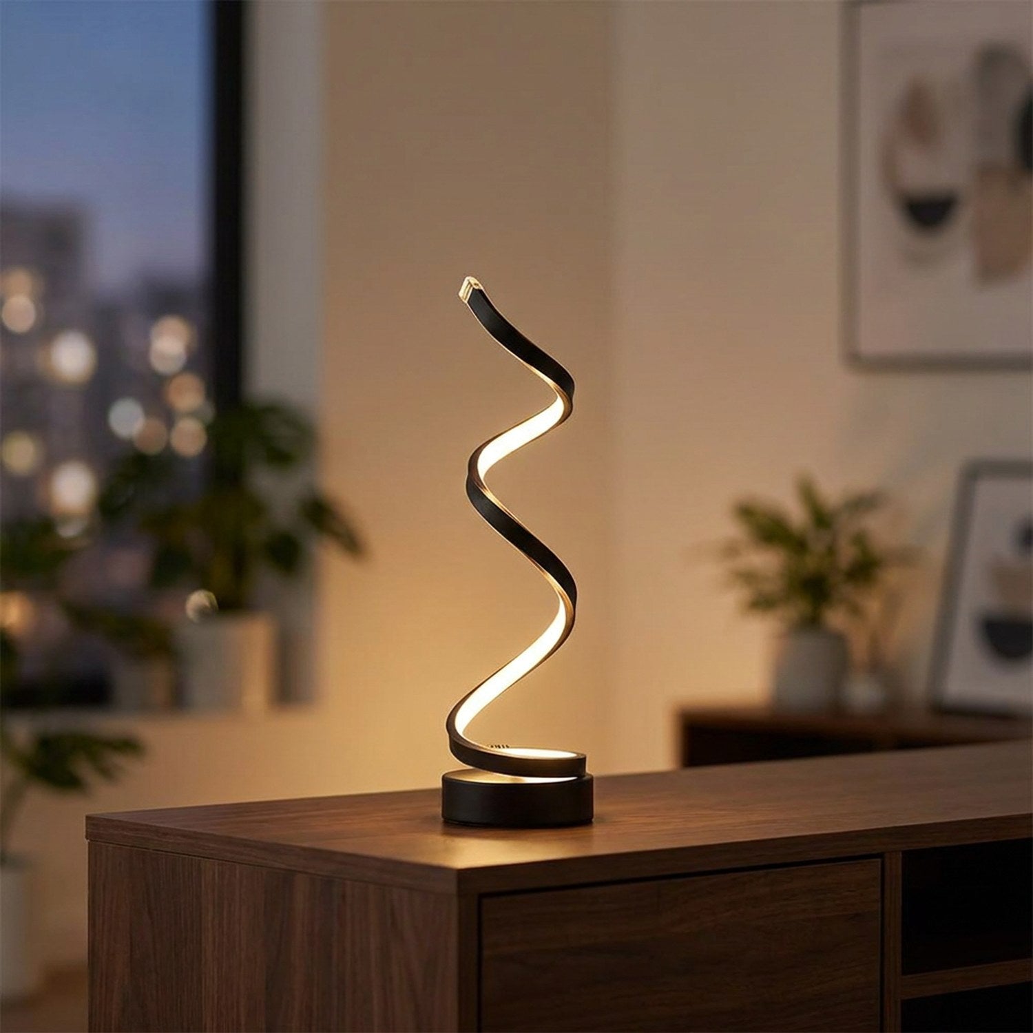 Lampe design en spirale LED noire allumée sur une console en bois foncé