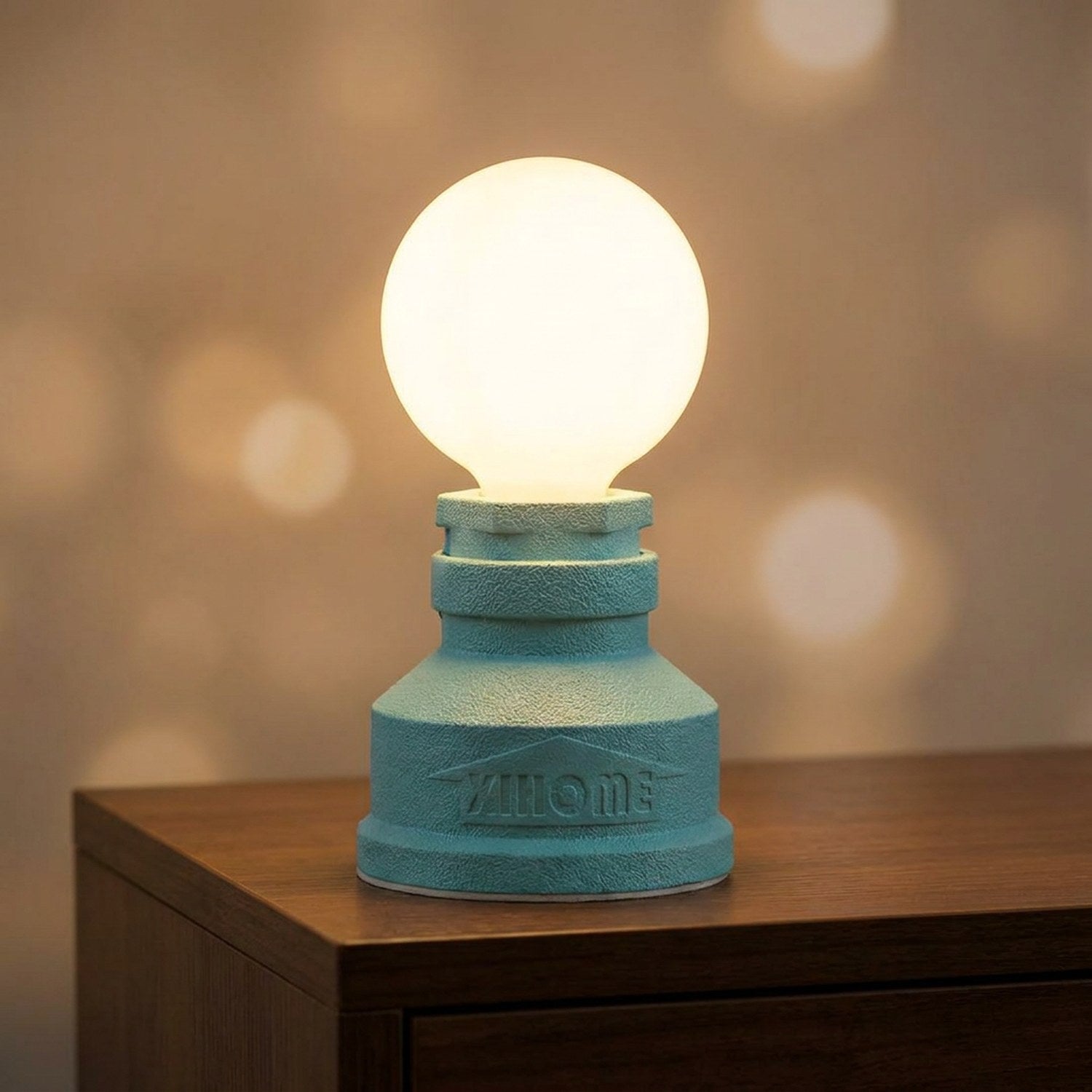 Lampe tuyau industrielle coloris bleu turquoise allumée