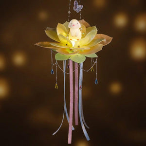 Lanterne lotus jaune avec figurine lapin illuminée