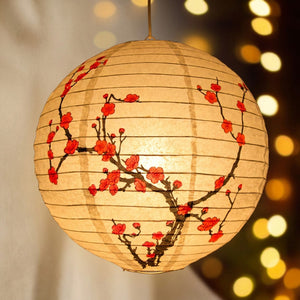 Lanterne chinoise en papier motifs traditionnels à suspendre lumière dorée