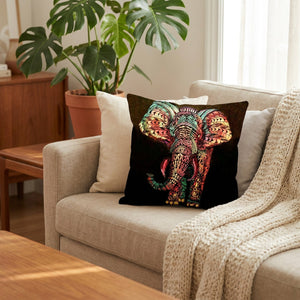 Coussin éléphant mandala coloré sur un canapé en lin beige avec plaid