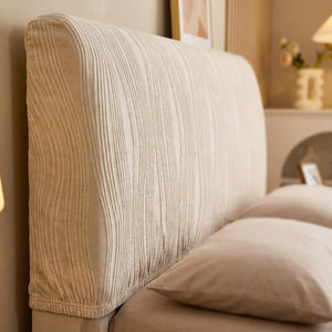 Gros plan sur la texture en velours jacquard de la housse de tête de lit