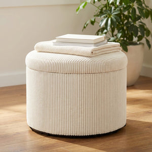 Pouf rond en velours côtelé servant de siège d'appoint avec des livres
