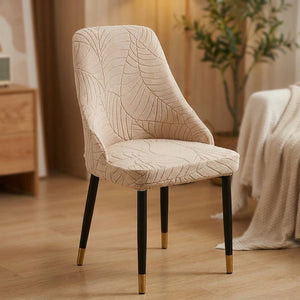 Gros plan du tissu jacquard beige au motif feuilles en relief extensible sur une chaise