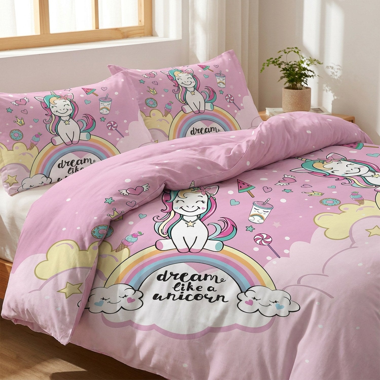 Détail des taies et du coin de la housse de couette licorne rose