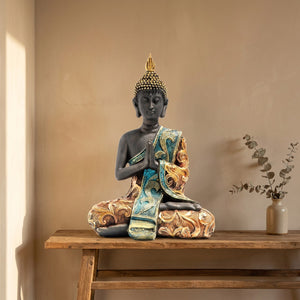 Statuette bouddha décorative en résine noire sur console scandinave, décoration intérieure zen