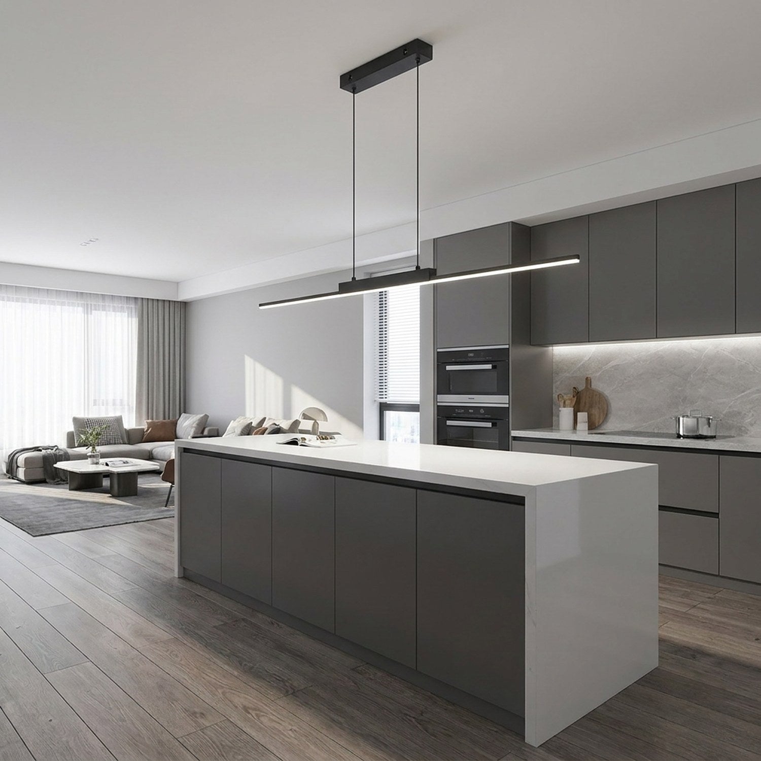 Suspension lumineuse noire au-dessus d'un îlot de cuisine contemporain