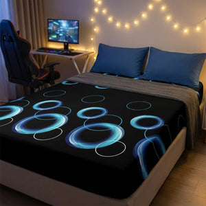 Drap-housse à cercles lumineux dans une chambre d'ado avec guirlande lumineuse