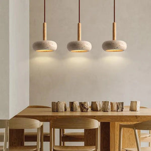 Suspension travertin lumière chaude ambiance cosy salon