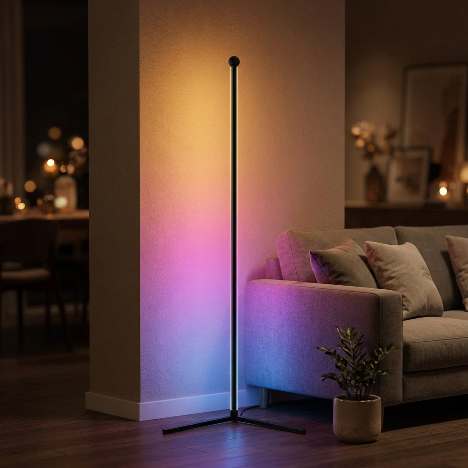Lampadaire d'angle LED RGB noir allumé dans le coin d'un salon avec une lumière colorée