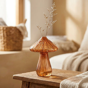 Vase champignon en verre marron au chapeau pointu avec une tige séchée