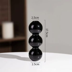 Vase en verre noir S style nordique fond blanc
