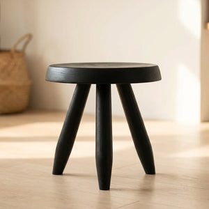 Tabouret rond bas en bois noir avec pieds tripode