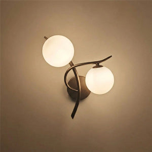 Applique murale noire boules de verre orientation droite
