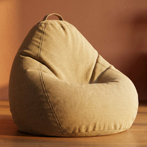 Grand pouf poire beige en tissu coton et lin avec poignée de transport