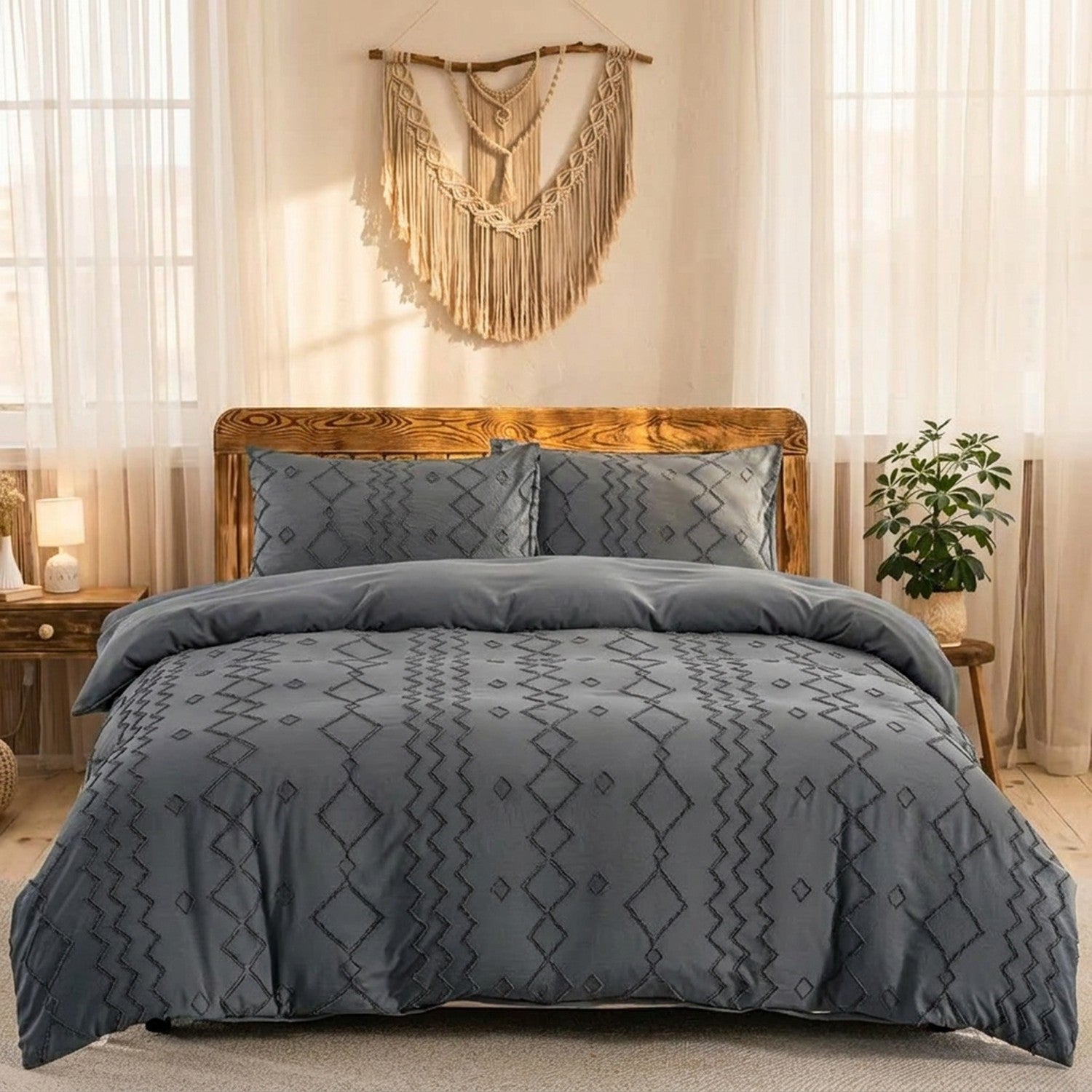 Parure de lit bohème grise anthracite à motif touffeté sur un lit